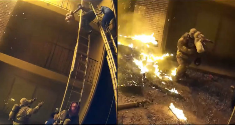 Criança é arremessada de prédio em chamas e salva por bombeiros